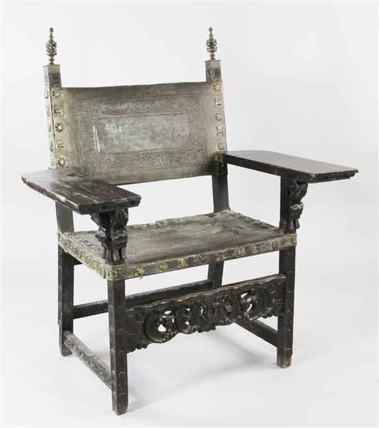 A 19th century Spanish carved oak armchair,